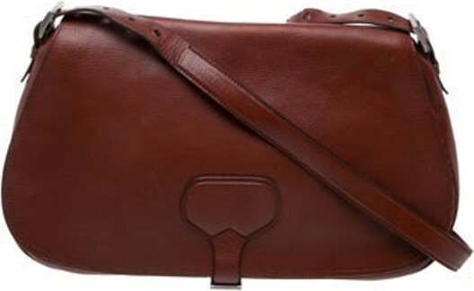 Prada Crossbody Bag Brown Vitello Daino Leather Vitello Daino Leather Silver-Tone Hardware Single Adjustable Shoulder Strap Leather Lining & Single Interior Pocket Buckle Closure at Front Unfortunately due to restrictions this item may not be eligible for shipping in all areas.