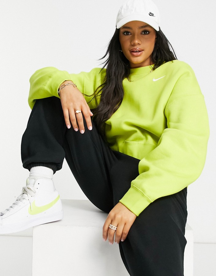 Nike pull over fleece sweatshirt in yellow - ShopStyle