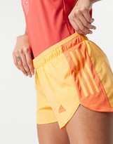 Thumbnail for your product : adidas 3in 3 stripe shorts in orange