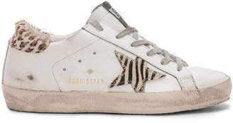 Golden Goose Superstar Sneakers in White Leather Wild | FWRD
