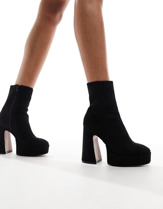 ASOS DESIGN Enchant heeled platform boots in black micro