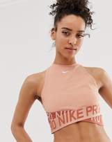 Thumbnail for your product : Nike Training crossover tank in rose gold