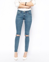 Thumbnail for your product : ASOS Whitby Low Rise Skinny Jeans in Rosebowl Mid Wash Blue with Busted Knees