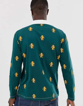 ASOS Design DESIGN relaxed long sleeve polo with all over heritage print