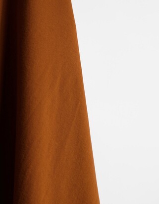 ASOS DESIGN organic jersey polo in brown