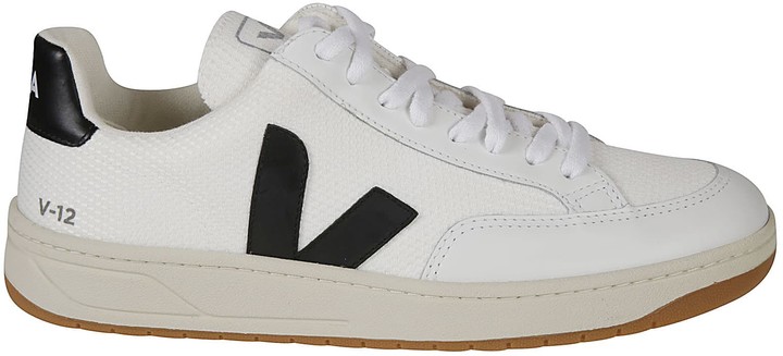 sneakers with v on side