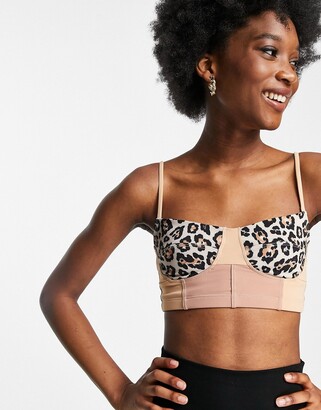 Onzie medium support bustier sports bra in golden cheetah print - ShopStyle