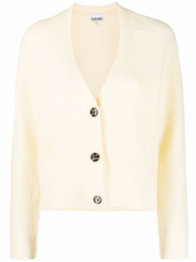 yellow button up sweater