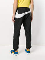 Thumbnail for your product : Nike woven logo embroidered track pants