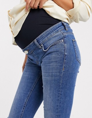 ASOS DESIGN Maternity high rise ridley 'skinny' jeans in mid wash blue with rips with over the bump band
