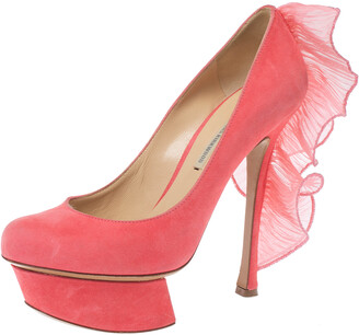 This neon satin pink Nicholas Kirkwood sandals is a must have