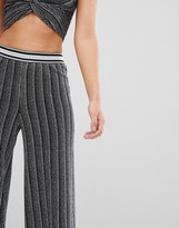 Thumbnail for your product : Flounce London high waisted trousers with elasticated waist in silver metallic