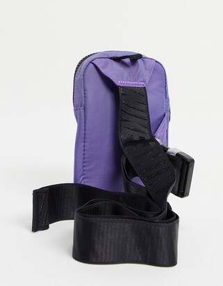 Nike Essentials iridescent flight bag in purple - ShopStyle