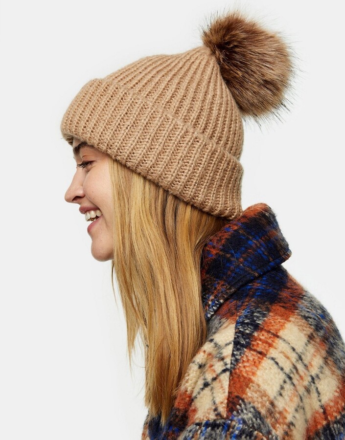 Topshop bobble hat with faux fur pom pom in camel - ShopStyle
