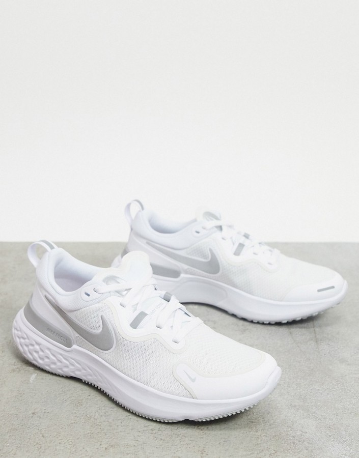 Nike Running React Miler trainers in white - ShopStyle Activewear
