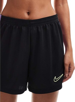 purple and black nike shorts