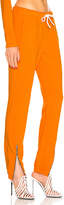 Thumbnail for your product : Cotton Citizen Milan Zip Jogger in Tangerine | FWRD