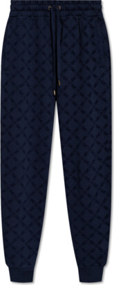 Louis VUITTON, Navy blue velvet pants, closing with a bu…
