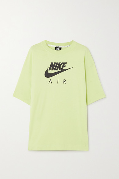 green and yellow nike shirt