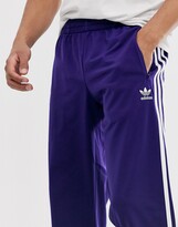 Thumbnail for your product : adidas firebird trackpants in purple