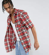 Thumbnail for your product : Reclaimed Vintage Inspired Oversized Shirt With Short Sleeves In Red Checked Flannel