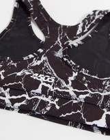 Thumbnail for your product : ASOS 4505 sports bra with marble print
