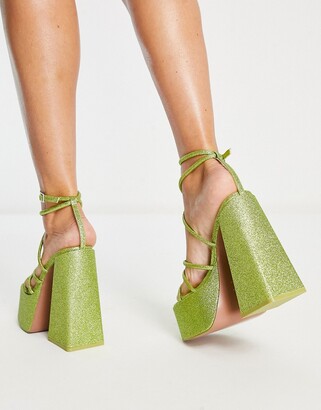 ASOS DESIGN Nutcracker extreme platform heeled sandals in green glitter