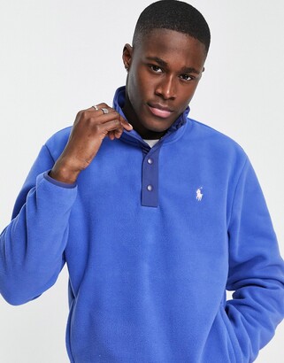 Polo Ralph Lauren icon logo polar fleece half zip sweatshirt in blue -  ShopStyle Jumpers & Hoodies