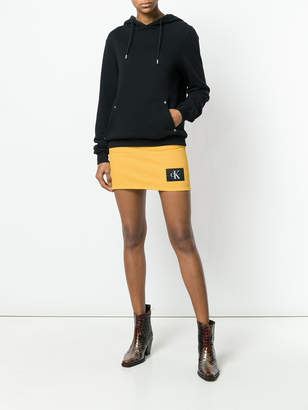 Calvin Klein Jeans logo patch denim skirt