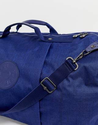 Kipling blue large holdall bag with black fluffy charm
