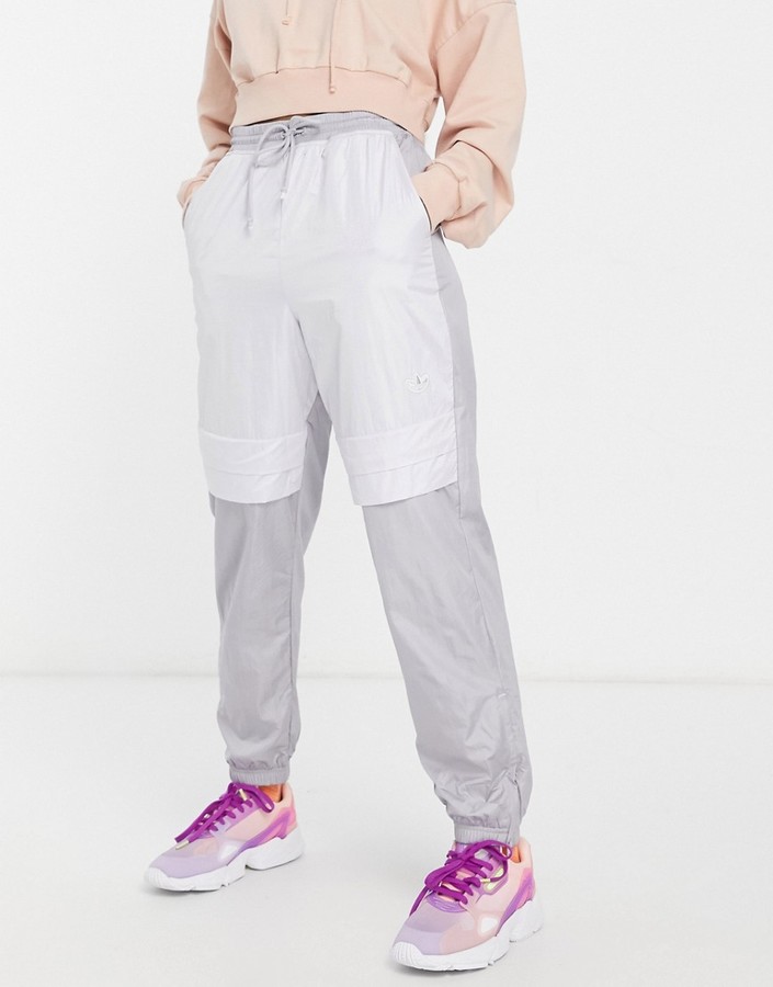 adidas Bellista cuffed sweatpants in gray and white - ShopStyle Activewear  Pants