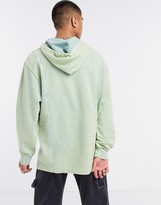 Thumbnail for your product : Collusion hoodie with print and stepped hem detail in acid wash