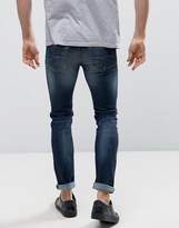 Thumbnail for your product : Benetton Skinny Jeans in Washed Denim With Distressing