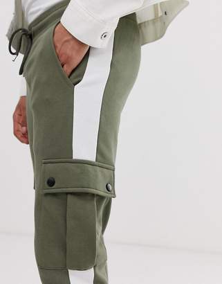 ASOS Design DESIGN skinny joggers with cargo pockets and side stripes in khaki