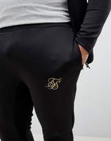 Thumbnail for your product : SikSilk Skinny Track Joggers In Black With Gold Logo Exclusive to ASOS