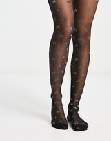 Thumbnail for your product : ASOS DESIGN 30 denier glitter star tights in black and silver