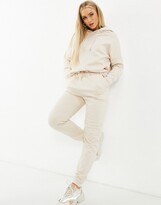 Thumbnail for your product : ASOS DESIGN tracksuit hoodie / slim jogger with tie in cotton in cream - CREAM