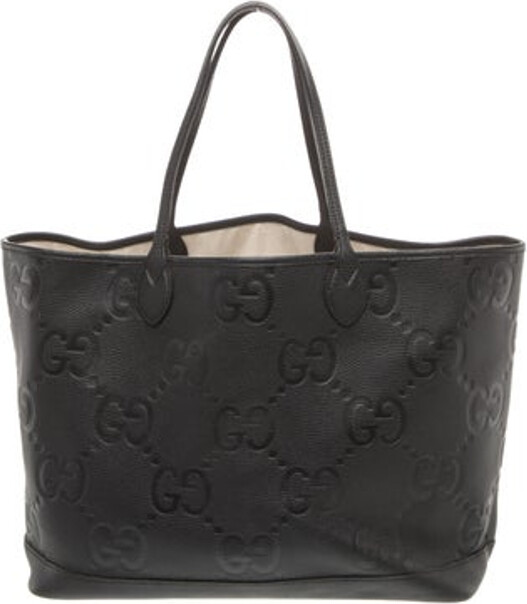 Gucci Tote Black Leather Jumbo GG Silver-Tone Hardware Dual Shoulder Straps Leather Trim Embellishment Canvas Lining Open Top Unfortunately, due to restrictions, this item may not be eligible for shipping in all areas.