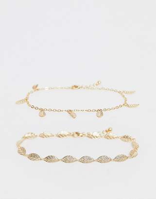 ASOS DESIGN pack of 2 anklets with feather pendants in gold tone