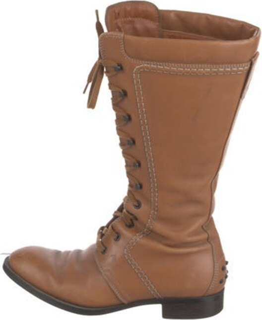 Tod's Leather Mid-Calf Lace-Up Boots Brown Round-Toes Lace-Up Closure at Uppers Unfortunately due to restrictions this item may not be eligible for shipping in all areas.