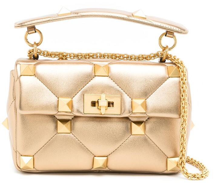 gold valentino clutch