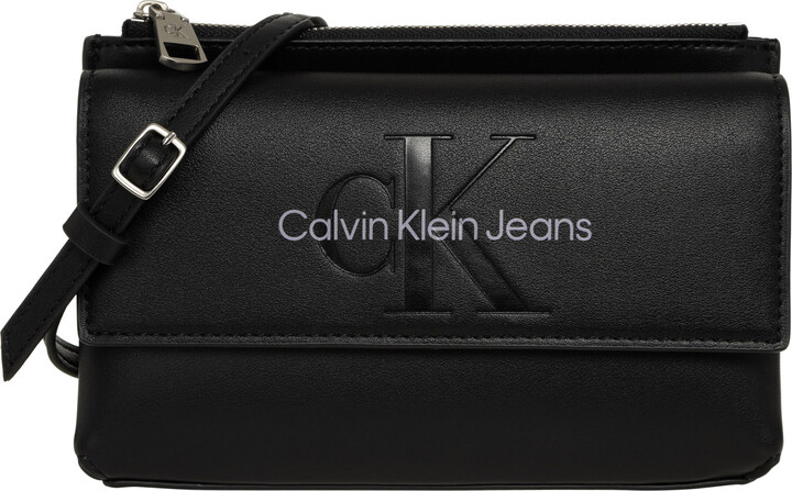 Calvin Klein Jeans monogram logo cross body bag in white - ShopStyle