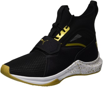 black and gold puma shoes