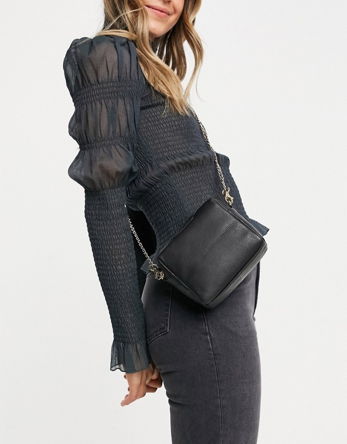 Paul Costelloe cross body bag with chain strap in black ShopStyle