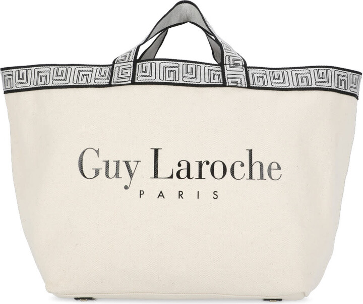 woman guy laroche bag