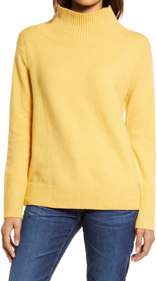 dark yellow sweater