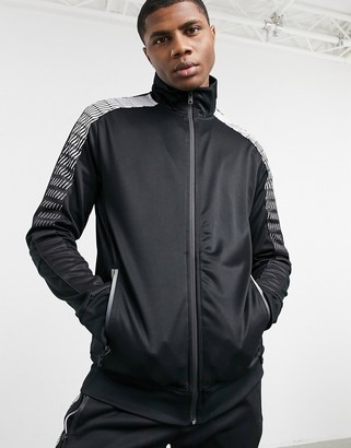 Bershka tracksuit jacket in black - part of a set - ShopStyle Outerwear