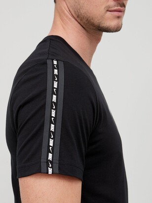 nike repeat swoosh top