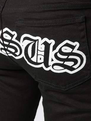 Versus logo embroidered skinny jeans