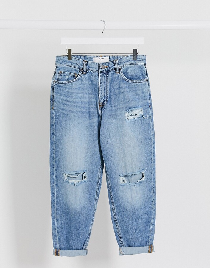 Bershka loose fit torn jeans in blue - ShopStyle